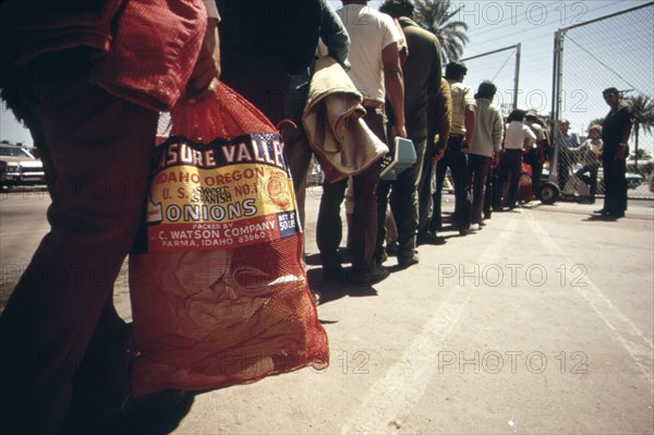 It's back to Mexico for these farm workers who were picked up by the border patrol at Calexico for illegal entry, May 1972