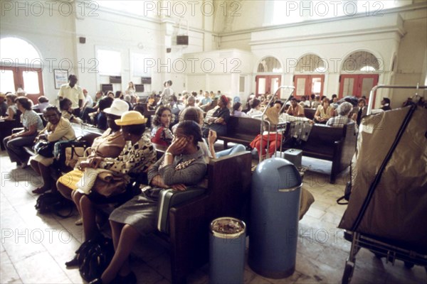 Passengers waiting for a train at the Fort Worth, Texas station, June 1974