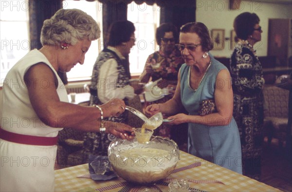 Refreshment time at the monthly meeting of the Seward chapter of the PEO Sisterhood. Meeting is held in the Seward Civic Center, May 1973 Lincoln, NE