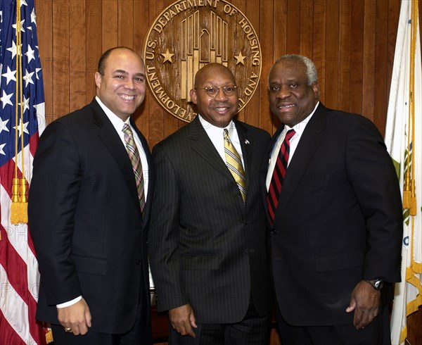 12/14/2005 - Secretary Alphonso Jackson, [center], with former Federal Communications Commission Chairman Michael Powell, [left], and U.S. Supreme Court Justice Clarence Thomas, [right], at HUD Headquarters.