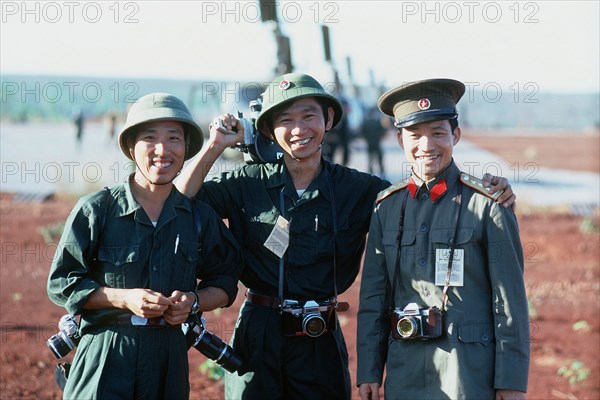 Two Viet Cong and a North Vietnamese Army officer