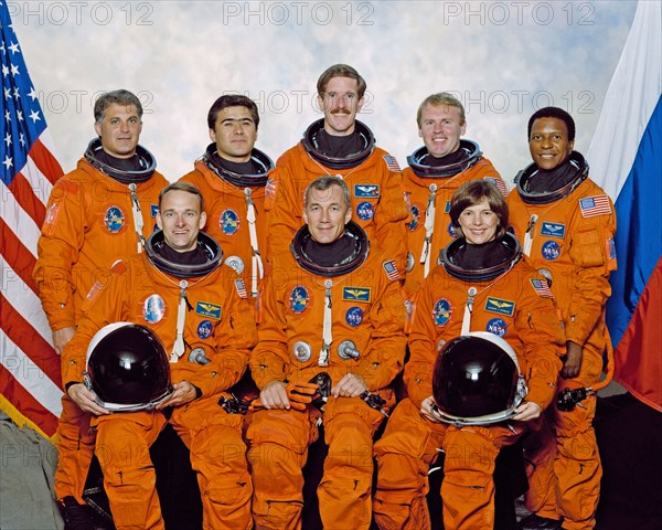 These seven astronauts and one cosmonaut (astronaut group photo) represent the flight crew for the STS-89 mission to Russia's Mir Space Station ca. 1997