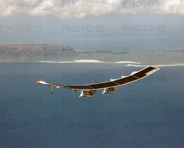 Pathfinder in flight over Hawaii - Pathfinder, NASA's solar-powered, remotely-piloted aircraft is shown while it was conducting a series of science flights to highlight the aircraft's science capabilities while collecting imagery of forest and coastal zon