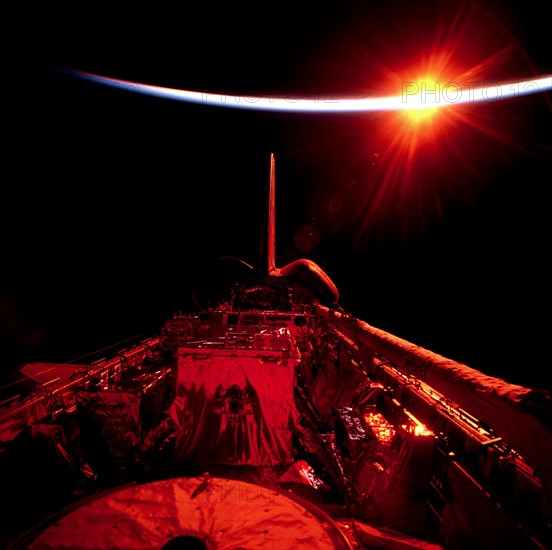 Views of the empty payload bay during sunrise