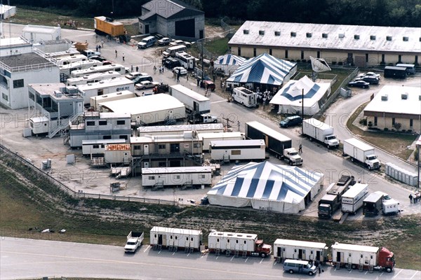 The filming of scenes for the movie "Contact" by Warner Bros.' cast and crew at Kennedy Space Center's Launch Complex 39 Press Site ca. 1997