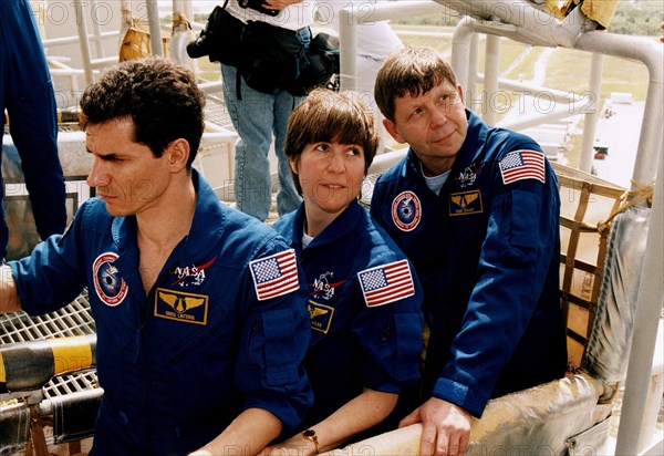 STS-83 Payload Specialist Gregory Linteris, Mission Specialist Janice E. Voss, and Payload Specialist Roger K. Crouch participate in emergency egress training at Launch Complex 39A ca. 1997