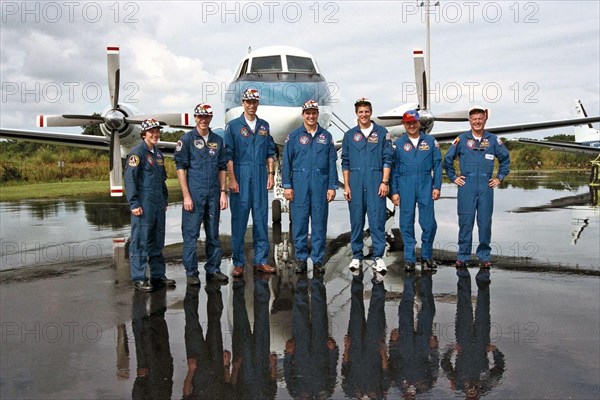 Members of the STS-86 crew pose for a last photograph at the Skid Strip on Cape Canaveral Air Station before flying back to their home base ca. 1997