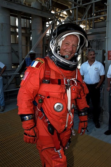 Dressed in his orange launch and entry spacesuit, STS-86 Mission Specialist Jean-Loup J.M. Chretien of the French Space Agency, CNES, participates in Terminal Countdown Demonstration Test (TCDT) activities at Launch Pad 39A ca. 1997