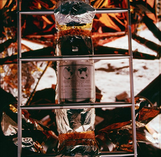(20 July 1969) --- Close-up view of the plaque which the Apollo 11 astronauts left on the moon in commemoration of the historic lunar landing mission. The plaque was attached to the ladder on the landing gear