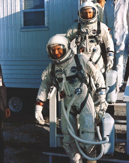 (21 Aug. 1965) --- Astronauts L. Gordon Cooper Jr. (foreground) and Charles Conrad Jr. leave suiting trailer at Pad 16 during Gemini-5 countdown at Cape Kennedy, Florida