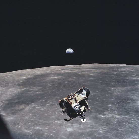 (21 July 1969) --- The Apollo 11 Lunar Module ascent stage, with astronauts Neil A. Armstrong and Edwin E. Aldrin Jr. aboard, is photographed from the Command and Service Modules (CSM)