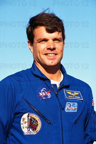 1997 - Kevin Kregel, commander of the STS-87 crew, participates in a news briefing at Launch Pad 39B during the Terminal Countdown Demonstration Test (TCDT) at Kennedy Space Center (KSC).