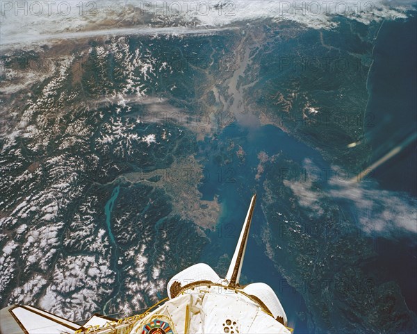 (12 - 20 Sept 1992) --- In this large format camera image, the forested Cascade Range appears along the left side; the Pacific Ocean, on the right. The frame was photographed as the Space Shuttle Endeavour flew north to south over Vancouver and Seattle.