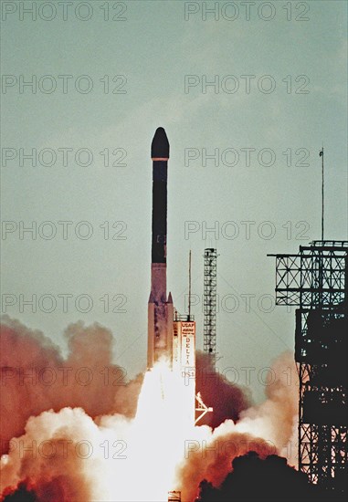 1998 - In a view from Press Site 1 at Cape Canaveral Air Station, a Boeing Delta II (7326) rocket lights up the ground as it propels Deep Space 1 into the sky after liftoff from Launch Complex 17A.