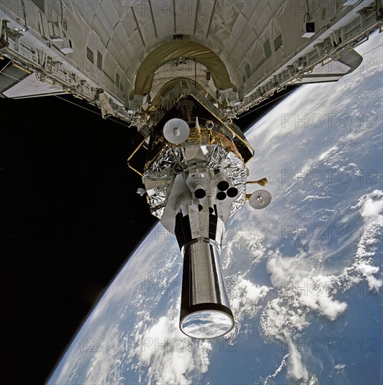 1991 - STS-44 DSP / IUS spacecraft tilted to predeployment position in OV-104's PLB