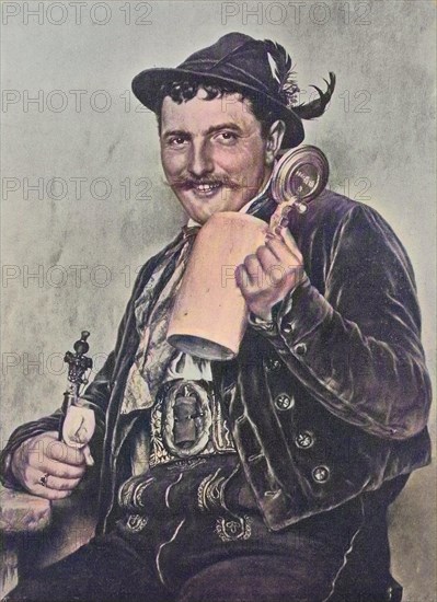 Bavarian man wearing traditional dress and holding a beer mug and a pipe