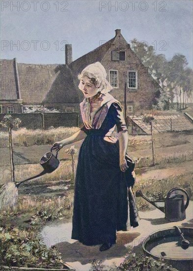 Girl watering in the home garden