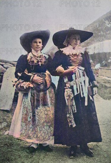 Bride and bridesmaid in the traditional dress of Val Gardena