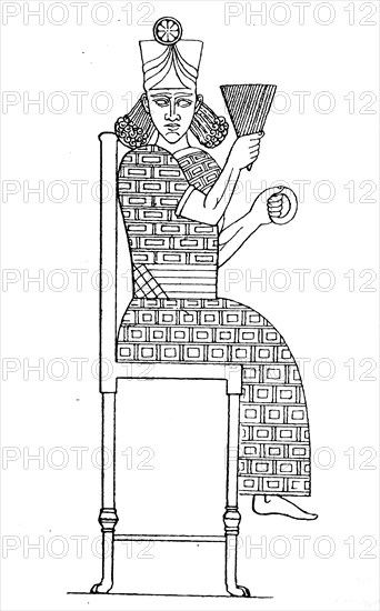 Female deity in Assyrian ladies' dress