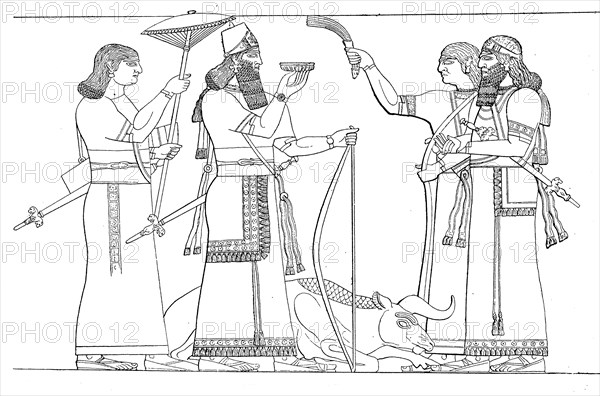 Assyrian king with servants and bearers