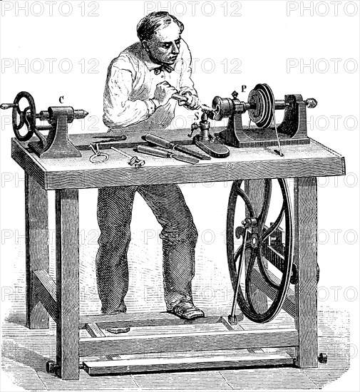 Man working at a lathe