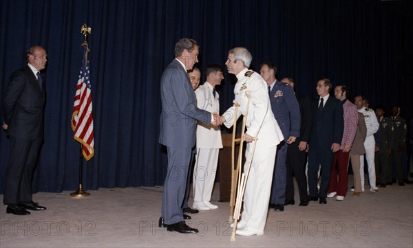 President Nixon greets former prisoner of war John McCain