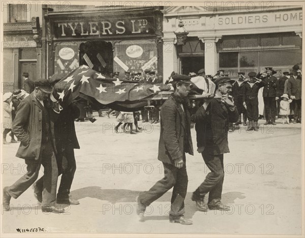 Carrying a body recovered from the sinking of the Lusitania