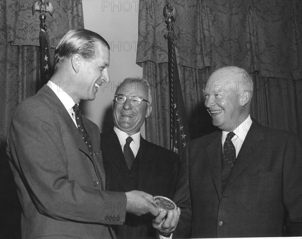 President Eisenhower gives medal to Prince Philip