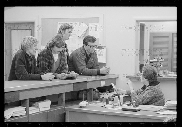 Young men inquiring about selective service registration