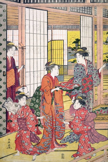Young women with a tray of sweetmeats