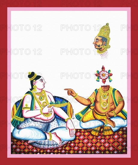 Krishna sits on a carpet