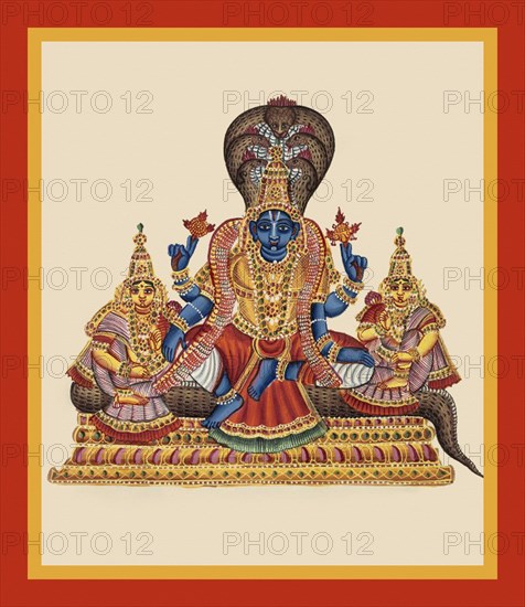 Vishnu sits on the coils of the serpent Shesha