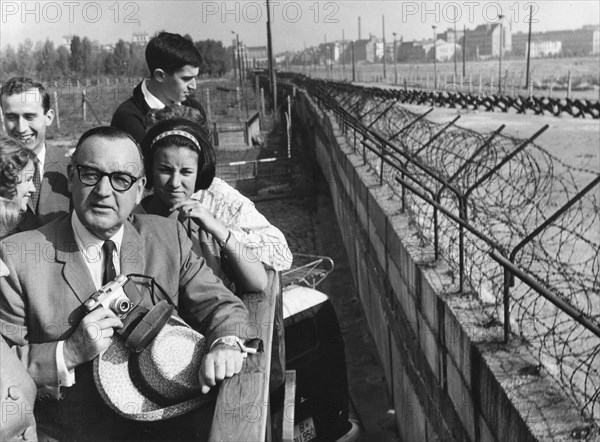 Governor Edmund G. Brown of California and his party look into East Berlin from observation platform at Potsdamer Platz. Berlin, September 4, 1963.