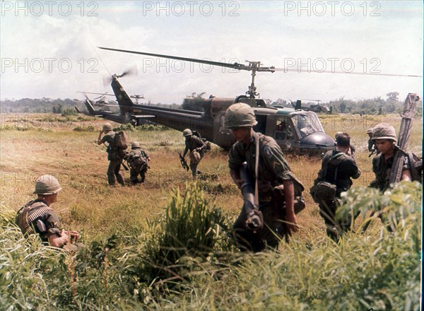 Helicopters bring in troops of 173rd Airborne Brigade during a search mission 40 Miles south of Saigon. Vietnam, 8/1965.