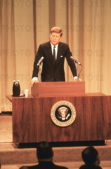 President Kennedy's first press conference broadcast live over TV and radio. Washington, DC, 1/25/61.
