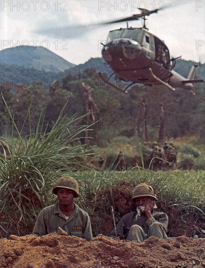 A UH-1D Tactical Transport helicopter used to move US troops into assault area during OPERATION WHITE WING. Near Bong Son, Vietnam, Feb 19, 1966.