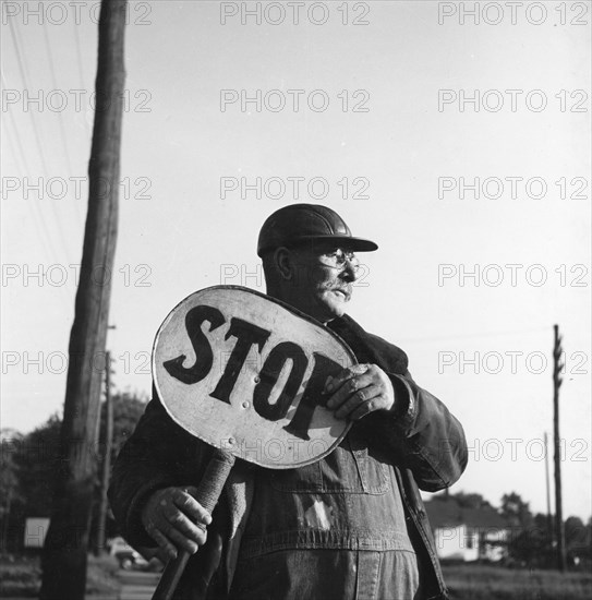 Stop Sign At Railroad Crossing