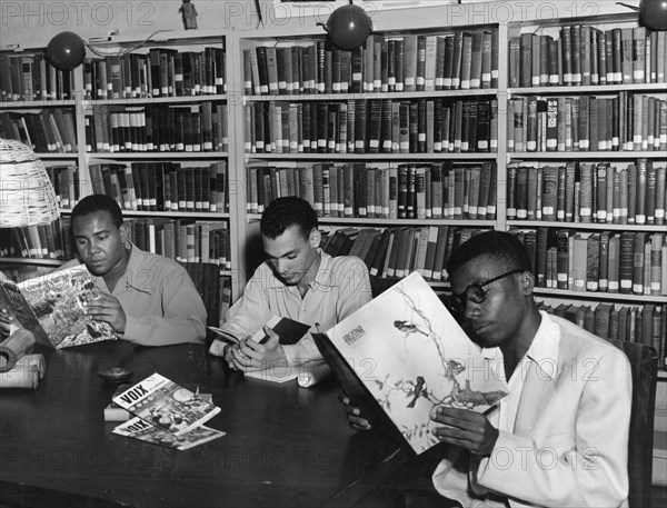 The library offers a quiet place for Haitians to study and read.