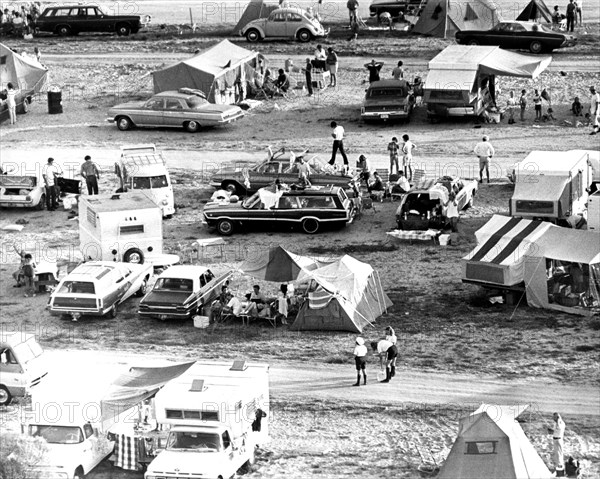 Hundreds of spectators on the beaches and roadways near the NASA Kennedy Space Center