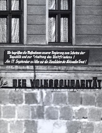 East German Banner Reads'We Agree with the Measurements Taken By Our Government in Order to Protect the Republic and to Promote World Peace! We Will Vote the Candidates of the National Front on Sept. 17th. The People Solidarity.'
