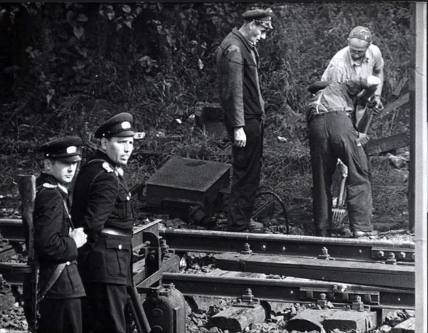 Guarded Construction Workers Demolishing Train Tracks on Thursday Morning (Sept. 28) at Wornholmer Strasse at the Border to West Berlin District Reinickendorf