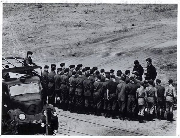 October 1961 - Young Soldiers, Most of Them In Their Teens, Line Up for Roll Call Before Commencing Their Day's Work Clearing Death Strip