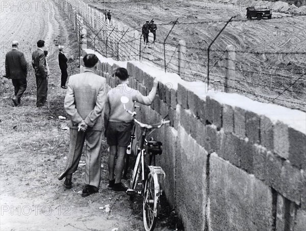 Here, on the Line Between the Outskirts of West Berlin (Left) and East Germany, the Communists Are Clearing a 100 Meter (330 Foot) Strip. In Distant Background is an East German Watchtower, from Which Armed Guards Cover the Border Area