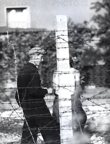 10/5/1961 - Civilian Man at The Sector Border at The South Part of Berlin, District of Berlin- Rudow, Wearing Bugging Devices and Cameras to Take Picture of Anybody Close to the Western Part of the Border Near The Barbed Wire