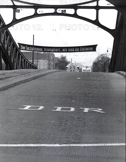 The Banner Exclaims 'Socialism Will Prevail We Are Stronger' Under It the Letters 'DDR' Directly Painted on the Street. East Berlin, Just As in the Three Other Berlin Sectors Are Supposed to Be Governed By All Four Powers But the Soviet Sector is Called the Capitol of East Berlin and DDR By Soviet Authorities