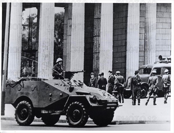 The East German Communist regime set up road blocks to halt traffic between the two sectors August 13 in an effort to stop the flow of refugees seeking freedom in the West.