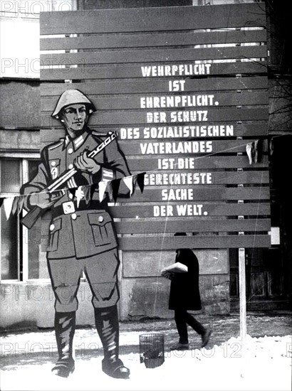 March 1962 - 'National Military Service is an Obligation of Honor to Our Socialist Fatherland and is the Most Righteous Thing in the World'. Propaganda Poster in East Berlin Advertising the 'Righteous Thing in the World'