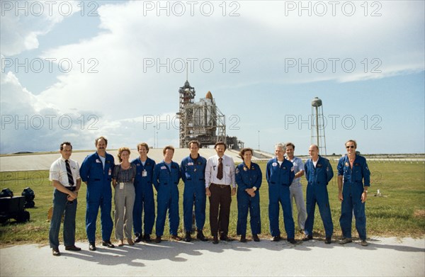 The participants are, from the left, Wilbur J. Etbauer, engineer with the VITT