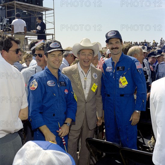 (4 July 1982) --- Inveterate space fan Roy Rogers with astronauts Jerry L. Ross