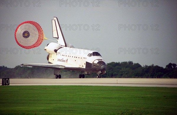 The orbiter drag chute deploys after Atlantis